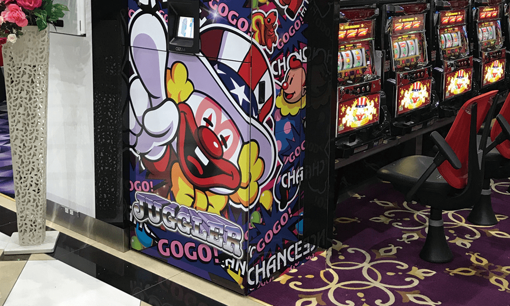 パチンコ屋両替機を覆い彩るキャラクターシート